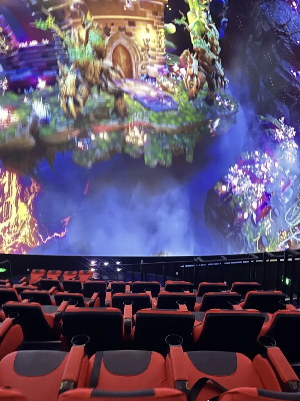 Immersive flying cinema with dome projection and motion seating